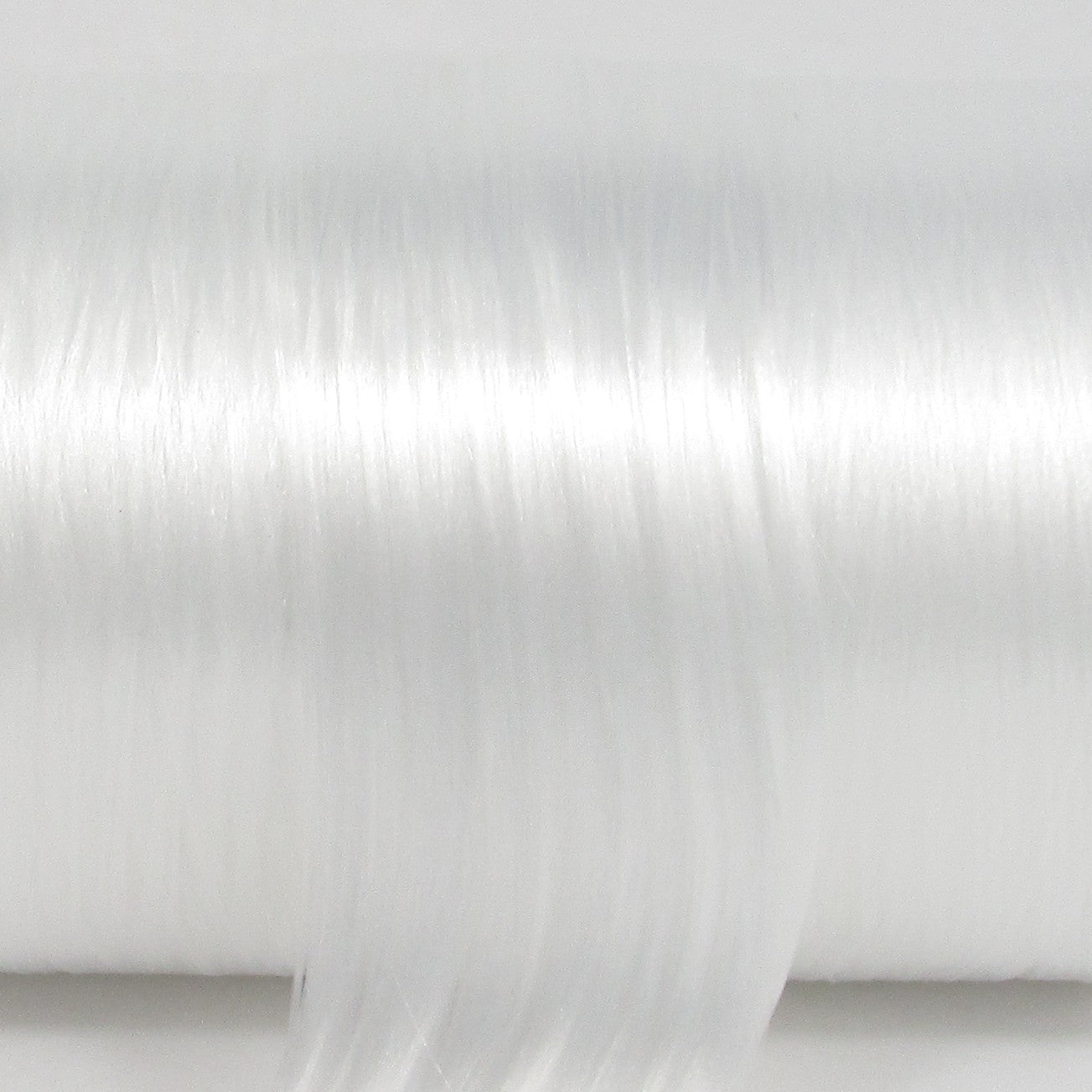 Angel White Nylon Doll Hair - Crisp pure white fiber for Storm (X-Men) and custom reroots. Silky nylon for high-definition curls.