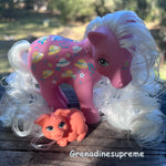 G1 My Little Pony Bonnie Bonnets in the Sundance pose, restored with Angel White Nylon Doll Hair from Shimmer Locks. This bright white nylon fiber provides a period-accurate color and material match for 1980s pony manes and tails.
