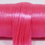 Cosmopolitan Pink nylon doll hair spool by Shimmer Locks. Perfect for Demon Hunter Mira customs! Smooth, vibrant cocktail-pink nylon fiber showing bright texture on the roll. 