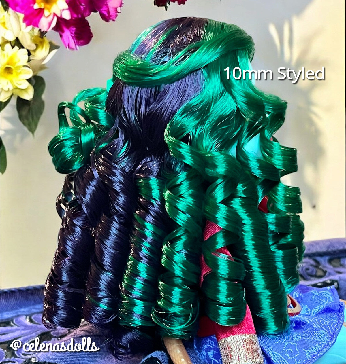 Back view of Monster High Jinafire Long custom reroot showcasing tight 10mm ringlet curl definition in Dark Embrace dark purple and Emerald Green nylon hair from Shimmer Locks. Rerooted by @celenas dolls.