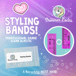 Pack of professional grade clear, latex-free elastic styling bands with ruler scale showing mini size for doll hair sectioning and rerooting