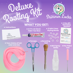 Deluxe doll hair rerooting kit includes reroot tool,  pre-poker tool, forceps, instructions, reroot needles, fabritac glue, styling bands, and mini spray bottle mister.