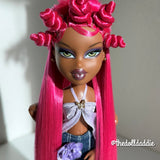 Front portrait view of Dragonfruit hot pink saran doll hair on a custom Bratz Pop Starz Sasha by @thedolldaddie. Highlights symmetry, length, and fiber sheen under direct light.
