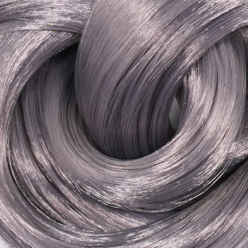 A hank of eclipse gray nylon doll hair. The dark gray has a subtle purple/violet hue and is great for rerooting and restoring your favorite Barbie, Monster High and Bratz dolls.