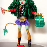 Full body shot of a Monster High G3 Jinafire Long doll restyled with a full head of voluminous emerald green curly nylon hair from Shimmer Locks.