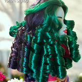 Side profile of a Monster High G3 Jinafire Long doll featuring a custom reroot with emerald green and Dark Embrace purple 10mm curly nylon hair from Shimmer Locks