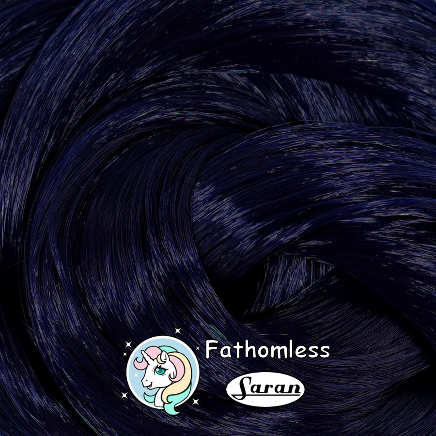 A hank of dark Japanese saran doll hair in Fathomless, a deep midnight blue shade that borders on black, displayed for doll restoration and customizing.