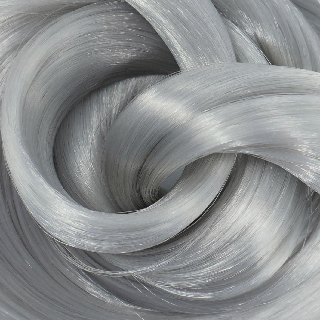 Granite Gray nylon doll hair by Shimmer Locks. Cool-toned medium slate gray fiber for custom Barbie, Monster High, and fashion doll reroots and restorations.