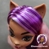 Top view of a custom Monster High Clawdeen doll head with long, straight Lilac Breeze light purple and Exotic Grap saran hair from Shimmer Locks. Rerooted by @hannahlectermh.