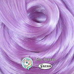 Close-up swatch of Lilac Breeze light pastel purple saran doll hair by Shimmer Locks showing smooth, glossy hair fiber. Great for rerooting Bratz and Barbie dolls.