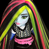 Close-up of Monster High Frankie Stein custom reroot showing a crisp side part with vibrant Pizzazz hot pink nylon hair. Rerooted by @celenasdolls.