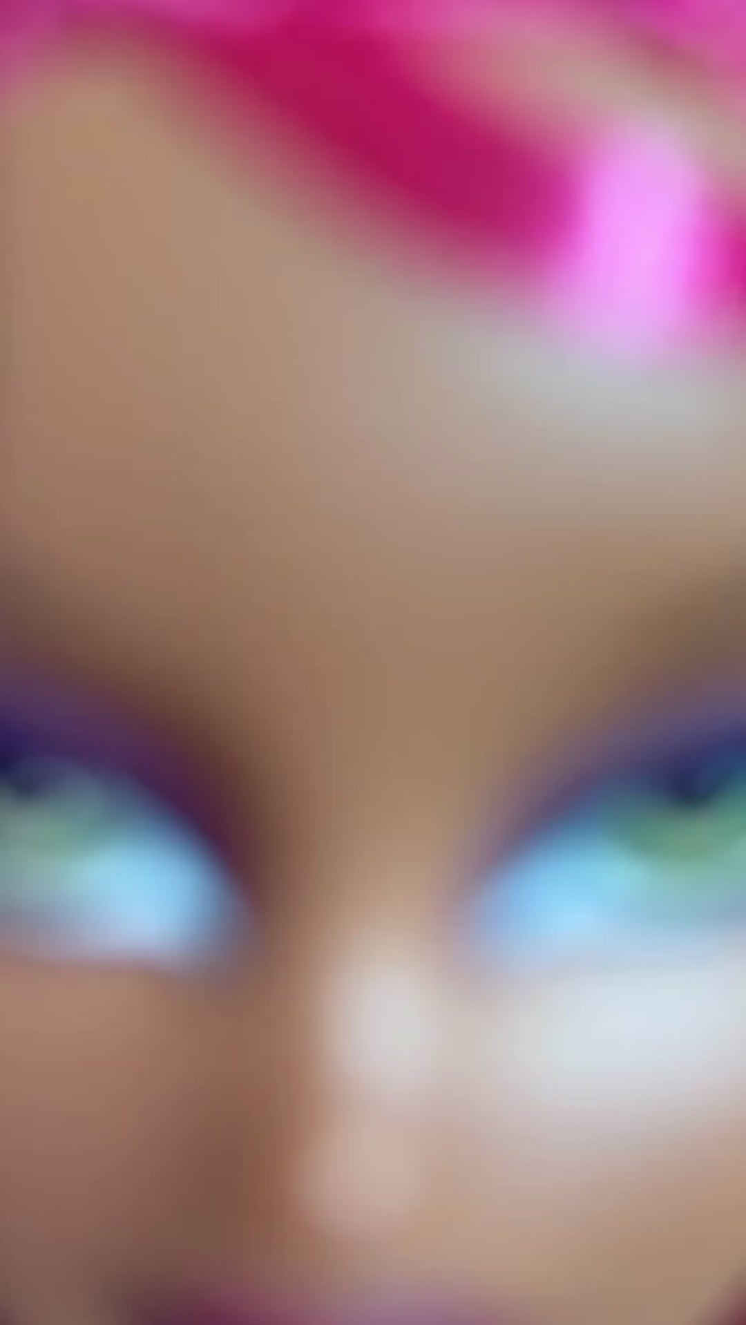Custom reroot example of Dragonfruit hot pink saran doll hair on a Bratz Pop Starz Sasha by @thedolldaddie. The hair is spun around to show it's movement and different ways it catches the light. 