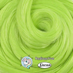 Close-up of Radioactive neon green saran doll hair for rerooting and restoration.