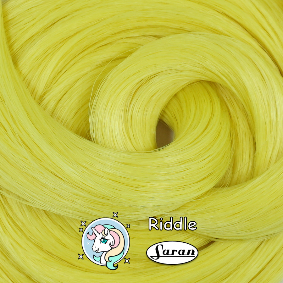 Riddle discontinued lemon-lime saran doll hair hank with orange lowlight for rerooting