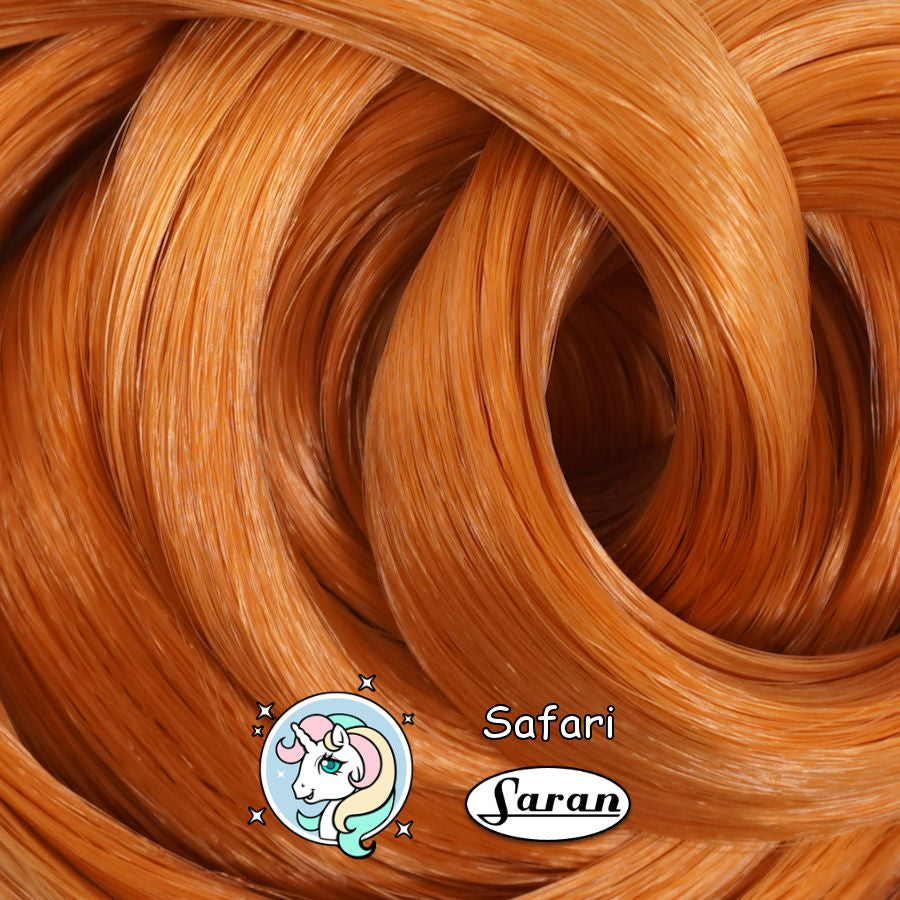 Close-up of Sarafi copper-red auburn saran doll hair for rerooting and restoring Barbies, Bratz and more!